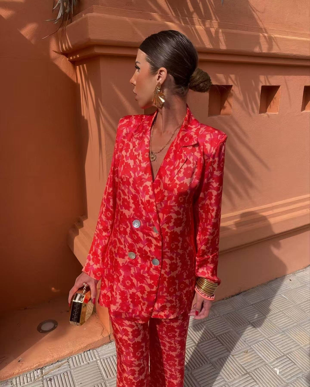 Multicolored women's jacket with floral print and double-breasted lapel