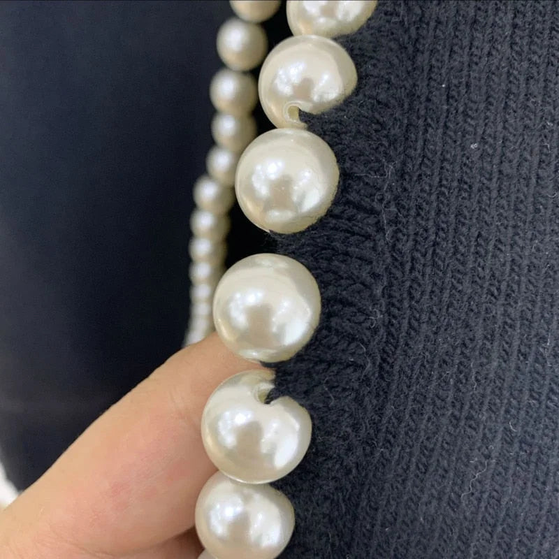 Elegant women's cardigan with pearl detail