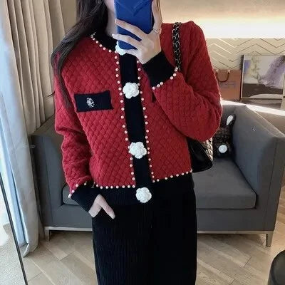 Women's cardigan with pearl embellishments and decorative pockets