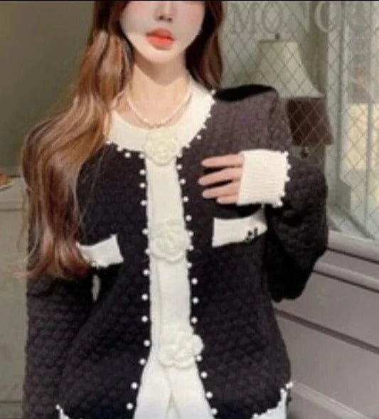 Women's cardigan with pearl embellishments and decorative pockets