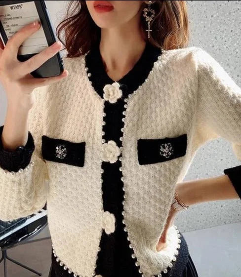 Women's cardigan with pearl embellishments and decorative pockets