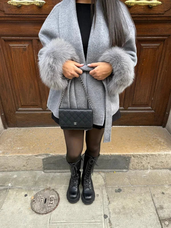 Belted women's coat with plush sleeves