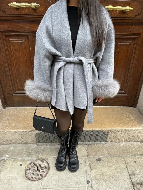 Belted women's coat with plush sleeves