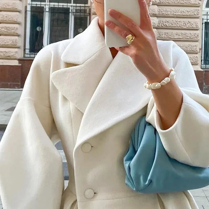 Long white women's coat with wide collar