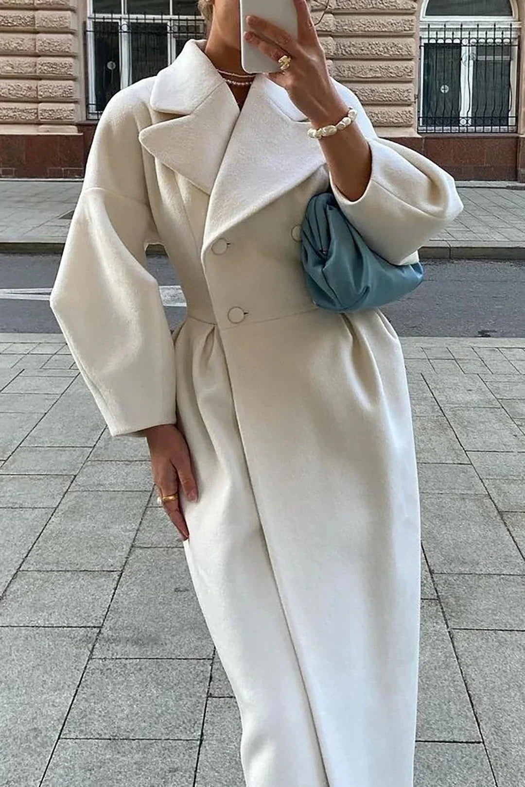 Long white women's coat with wide collar