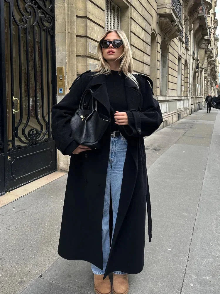 Long black coat for women with belt and wide lapels