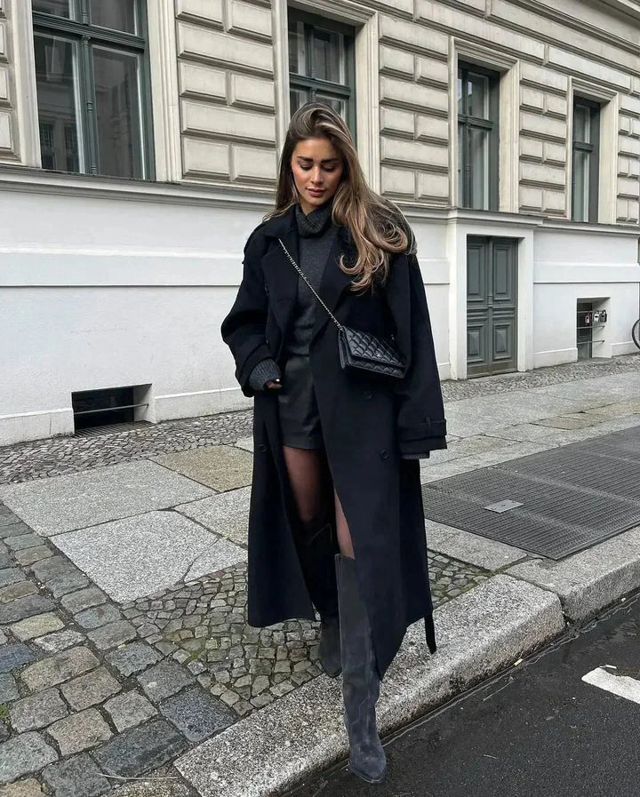Long black coat for women with belt and wide lapels