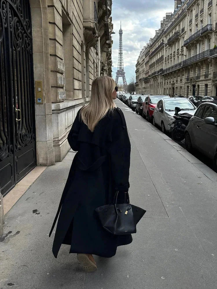 Long black coat for women with belt and wide lapels
