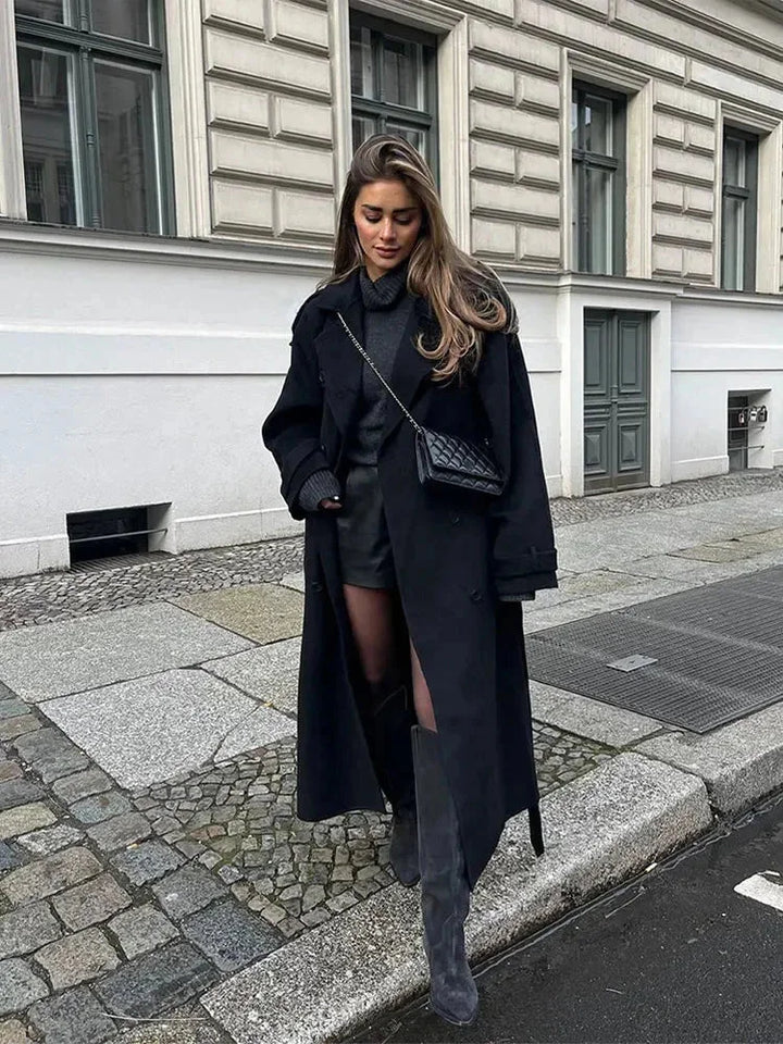 Long black coat for women with belt and wide lapels