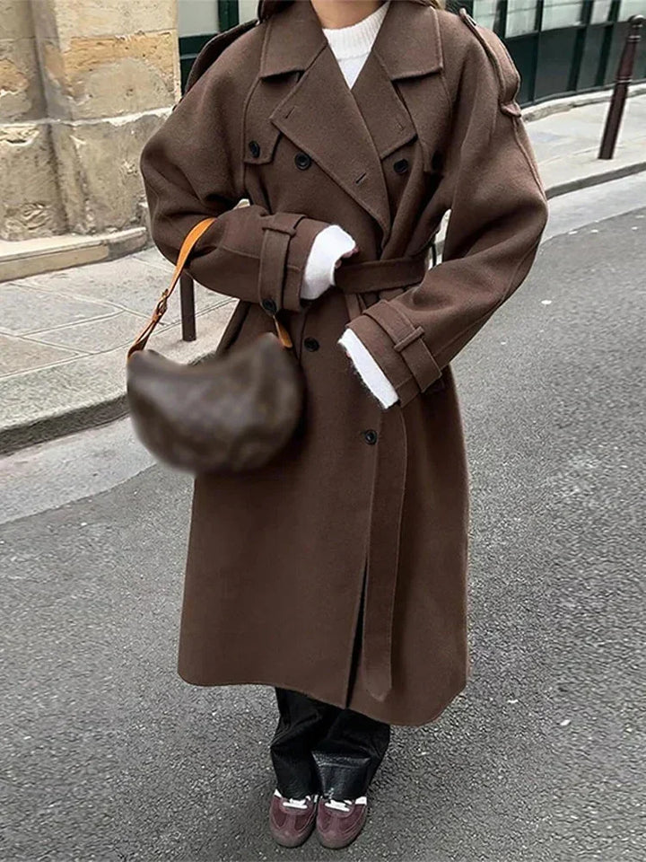 Mid-length women's coat with belt and buttons