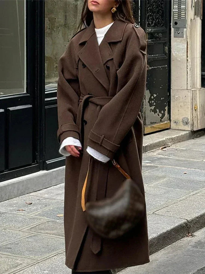 Mid-length women's coat with belt and buttons