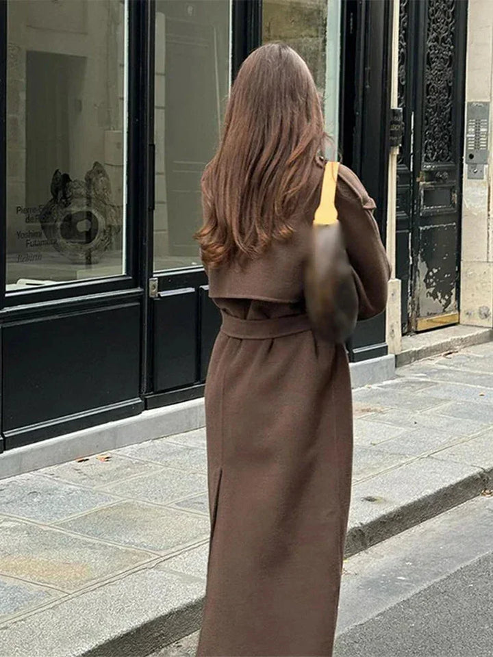 Mid-length women's coat with belt and buttons