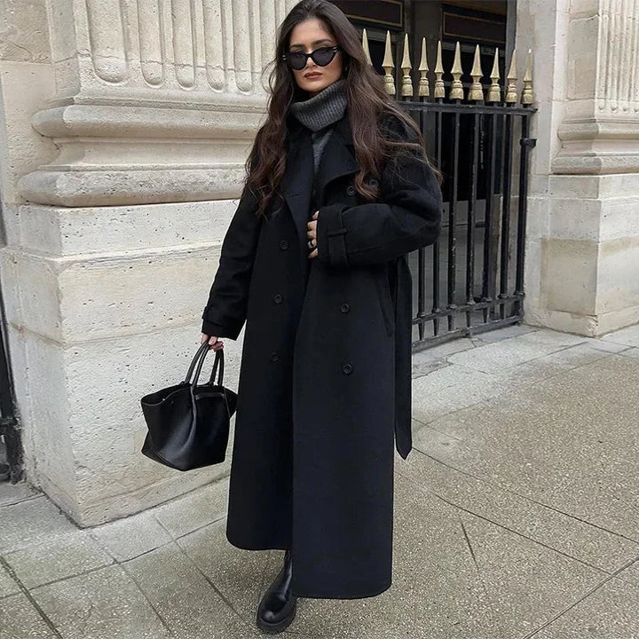 Mid-length women's coat with belt and buttons