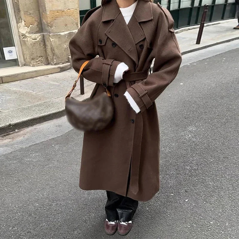 Mid-length women's coat with belt and buttons