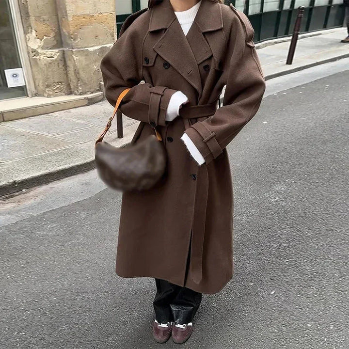 Mid-length women's coat with belt and buttons