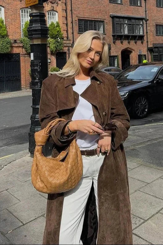 Brown women's trench coat with belt and lapels