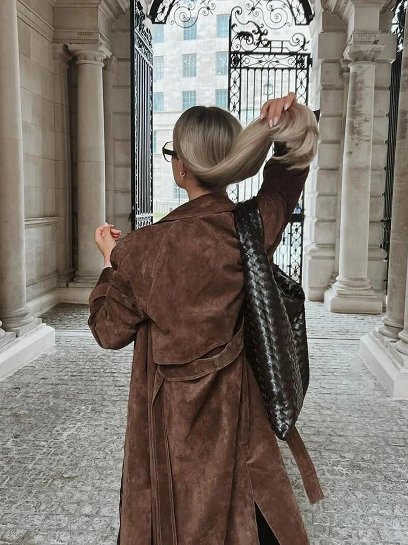 Brown women's trench coat with belt and lapels