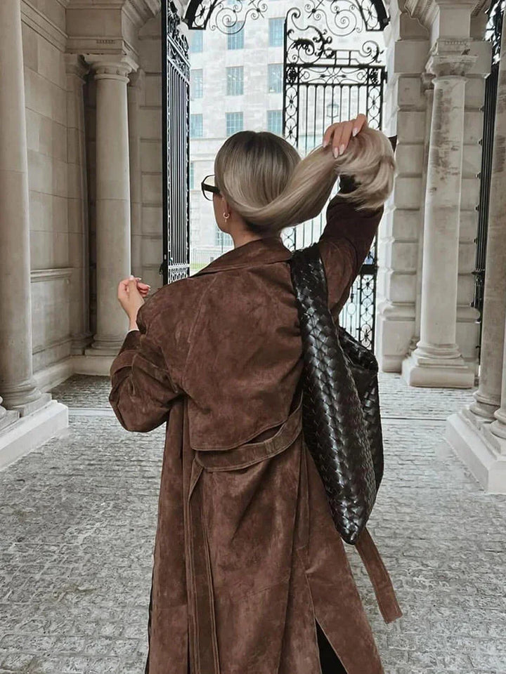 Brown women's trench coat with belt and lapels
