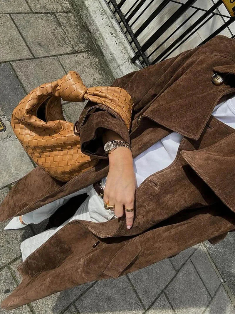 Brown women's trench coat with belt and lapels