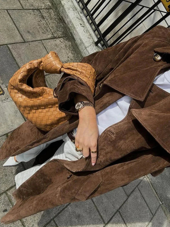 Brown women's trench coat with belt and lapels