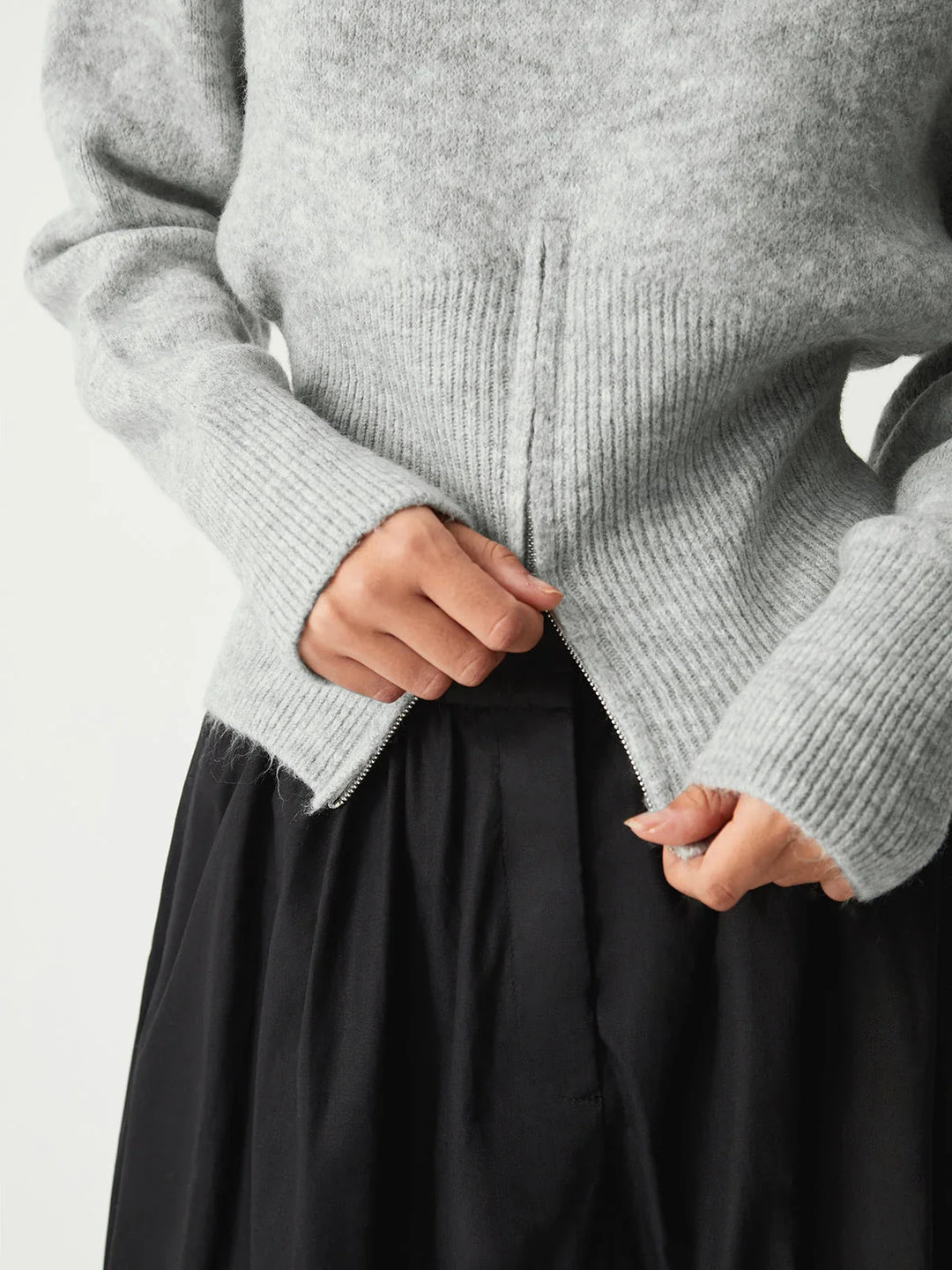 Gray women's sweater with half-zip and long sleeves