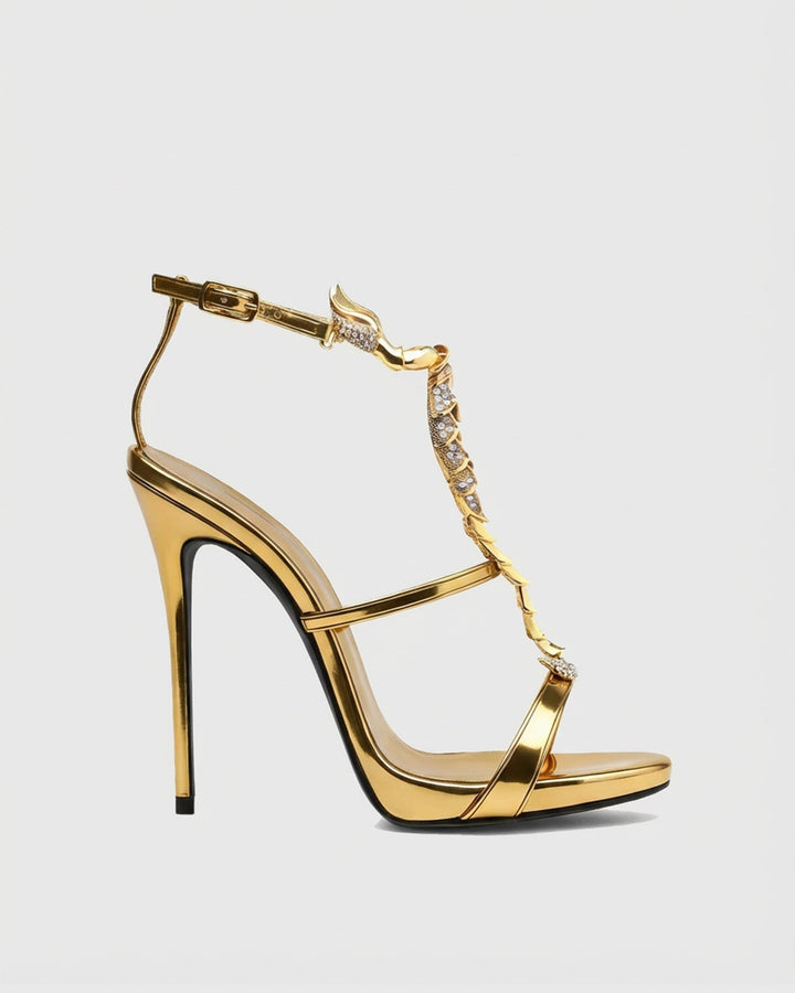 Pia Rhinestone Scorpion Strap Sandals In Gold