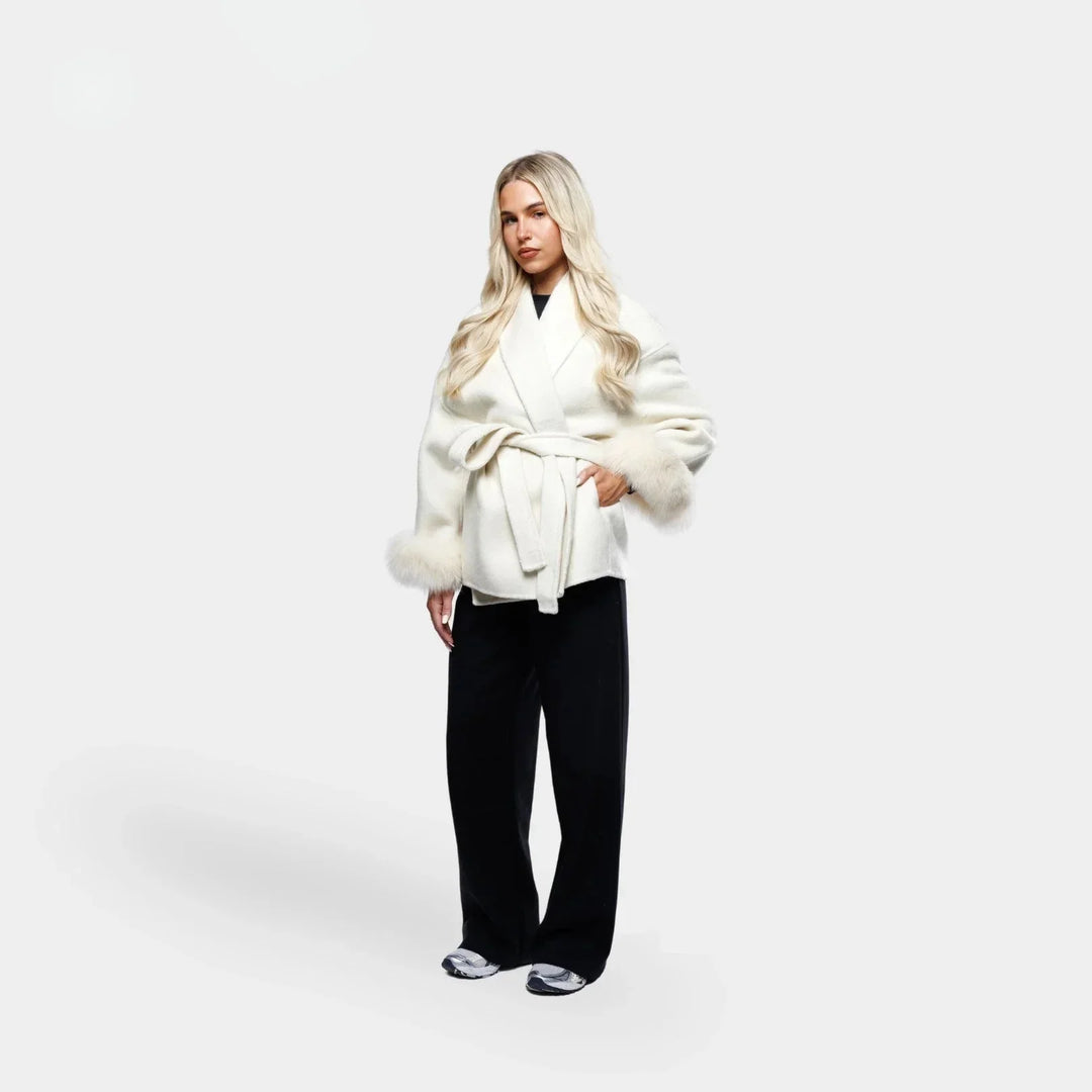 White belted women's jacket with synthetic fur sleeves