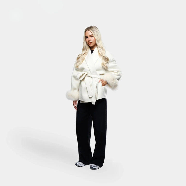 White belted women's jacket with synthetic fur sleeves