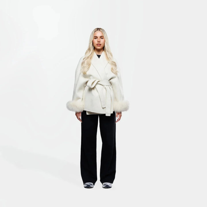 White belted women's jacket with synthetic fur sleeves