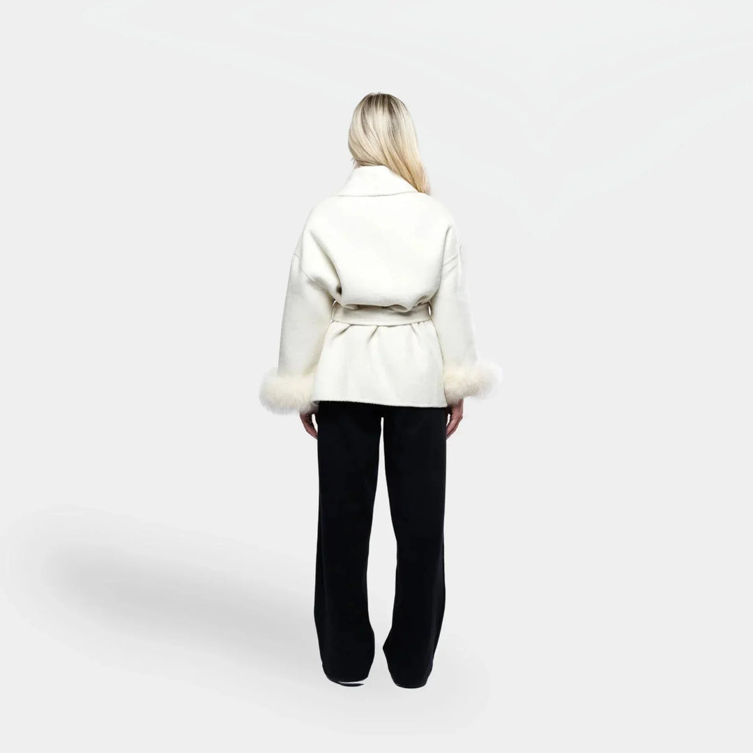 White belted women's jacket with synthetic fur sleeves