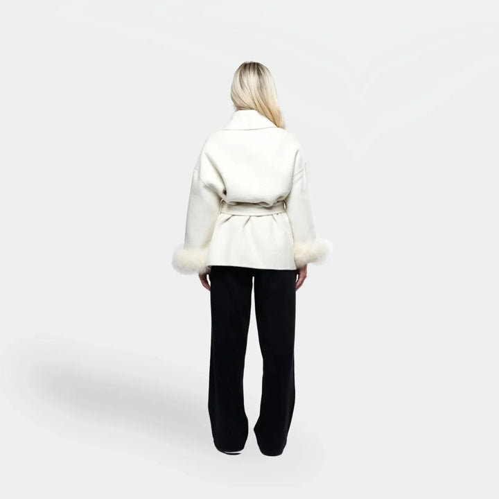 White belted women's jacket with synthetic fur sleeves