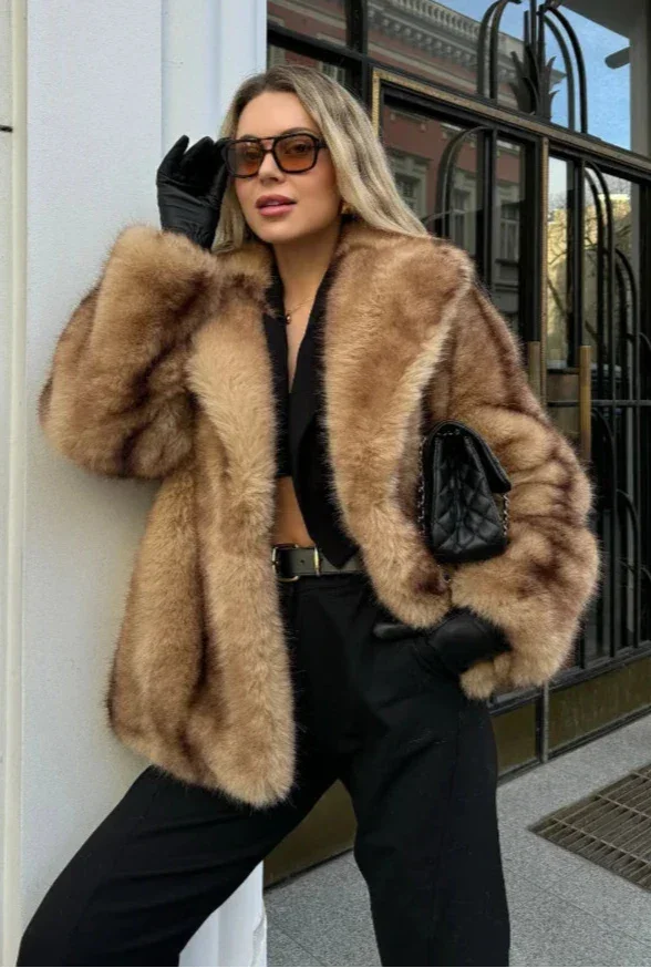 Elegant brown jacket for women with a striking closure