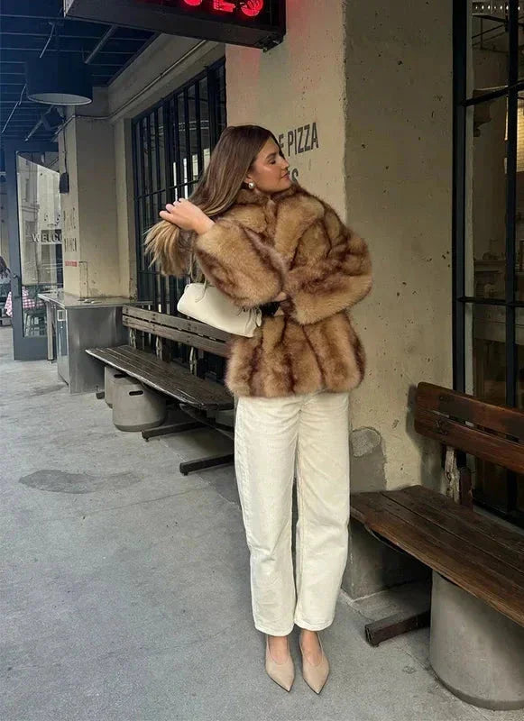 Elegant brown jacket for women with a striking closure