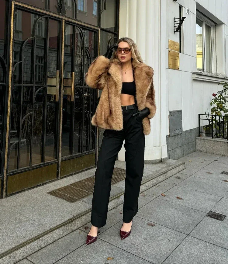 Elegant brown jacket for women with a striking closure