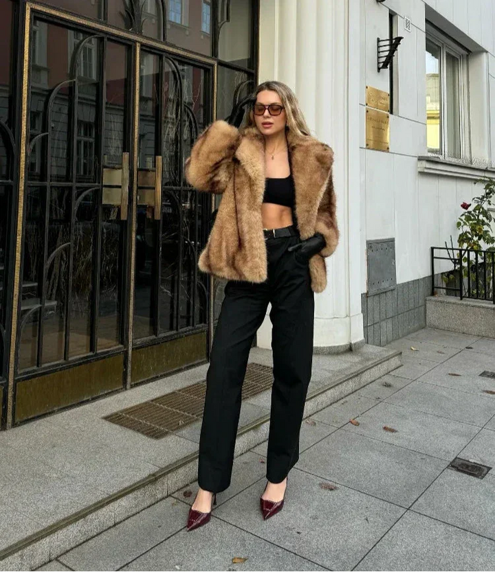 Elegant brown jacket for women with a striking closure