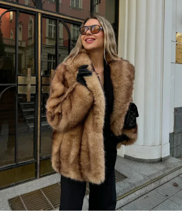 Elegant brown jacket for women with a striking closure